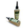 Two bottles of Gear Hugger dry bike lubricant on a white background
