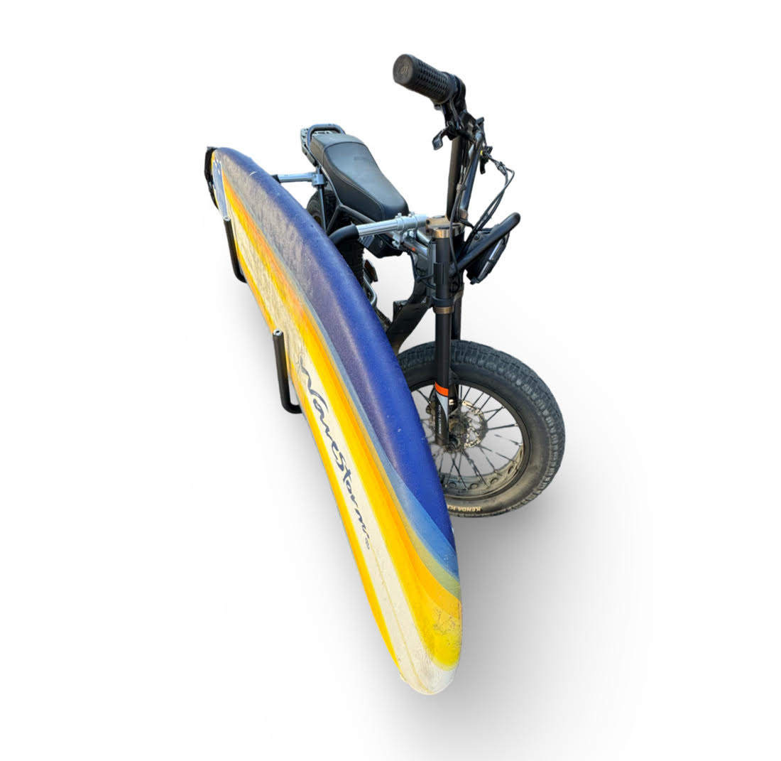 101 eBikes Seaside model with a surfboard rack and surfboard